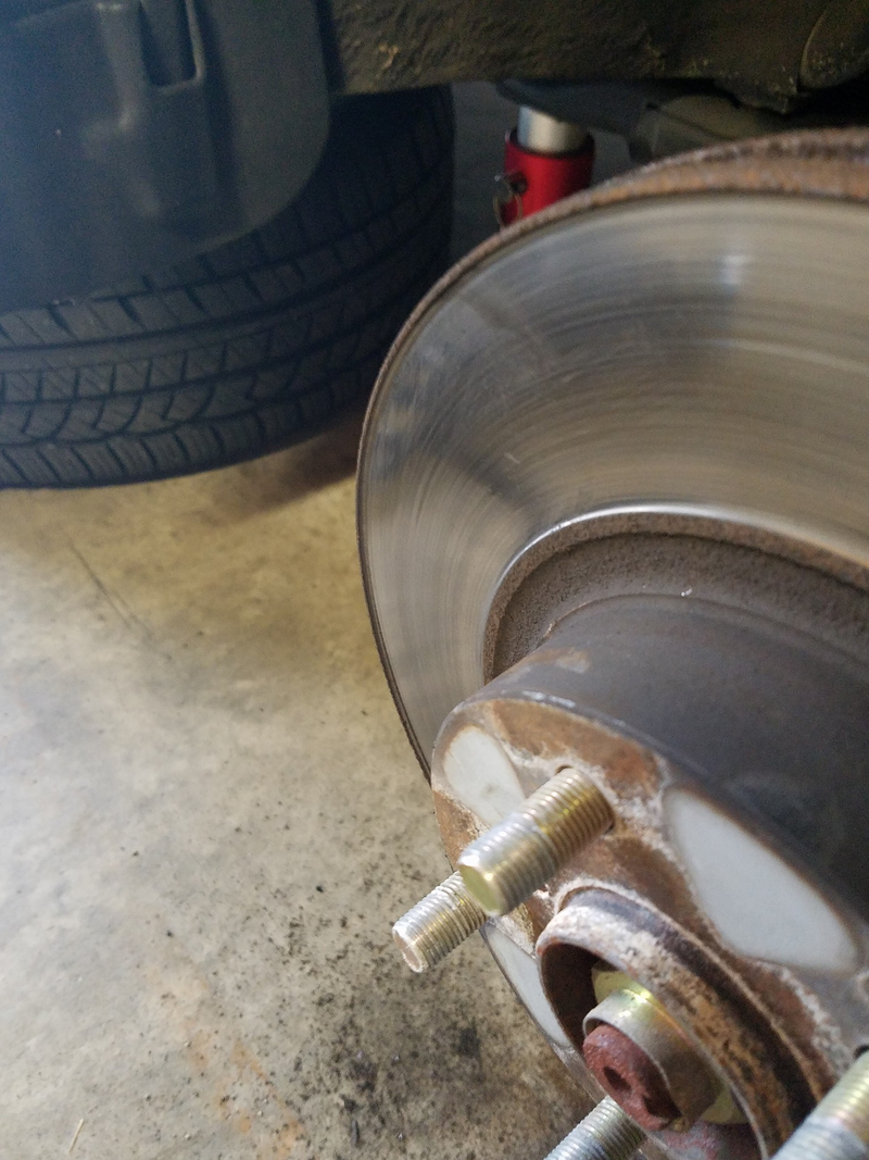 and the brakes of frustration. The previous owner had clearly just been changing pads for some time. brand new thick meaty pads were in there, but they were ruined by the lip on the rotor